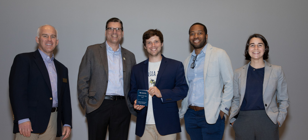 The MLOps team poses with GTRI Chief Technology Officer Mark Whorton (far left) and GTRI Director Jim Hudgens (second from left) after winning an IRAD of the Year award for their work on this project at GTRI's FY23 IRAD Extravaganza event.